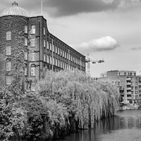 Buy canvas prints of View down the River Wensum in Norwich by Chris Yaxley