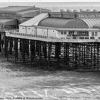 Buy canvas prints of Pavilion Theatre and Lifeboat station, Cromer Pier by Chris Yaxley
