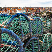Buy canvas prints of Crab pots and lobster traps in Whitby Harbour, North Yorkshire by Chris Yaxley
