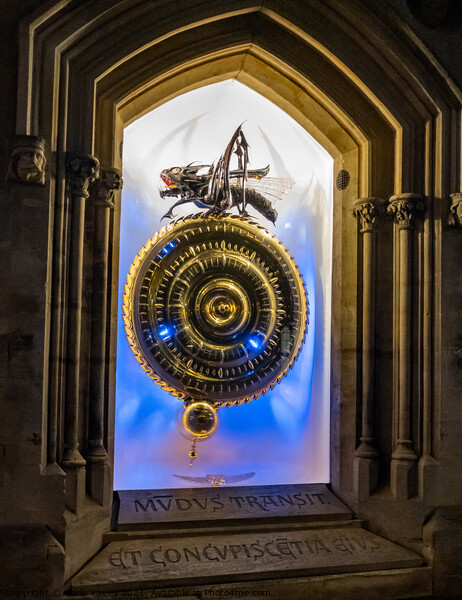 The Corpus Grasshopper clock illuminated at night Picture Board by Chris Yaxley
