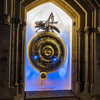 Buy canvas prints of The Corpus Grasshopper clock illuminated at night by Chris Yaxley