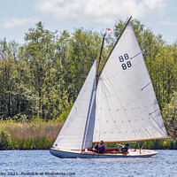 Buy canvas prints of Traditional wooden sailboat on Wroxham Broad, Norfolk by Chris Yaxley