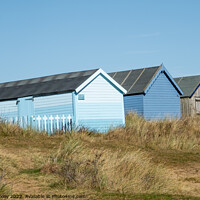 Buy canvas prints of Hunstanton beach huts, Norfolk coast by Chris Yaxley