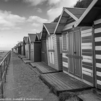 Buy canvas prints of Cromer Beach Huts on the Norfolk Coast by Chris Yaxley