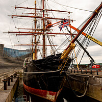 Buy canvas prints of Front on view of HMS Discovery war ship moored up beside the VA centre in Dundee’s waterfront by Chris Yaxley