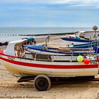 Buy canvas prints of Crab fishing boats on Cromer beach by Chris Yaxley