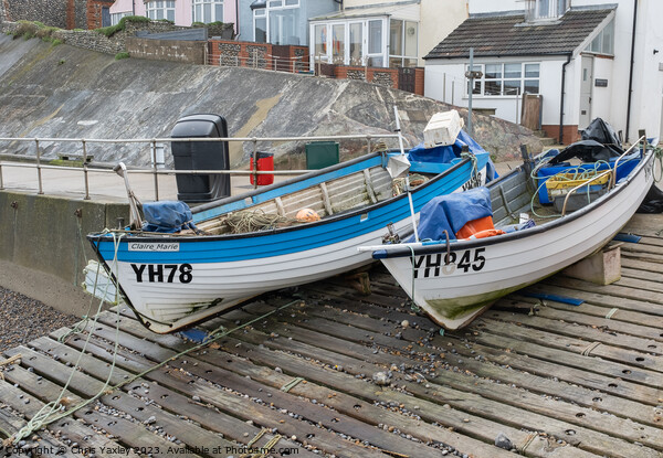 Fishing boats on the North Norfolk coast Picture Board by Chris Yaxley