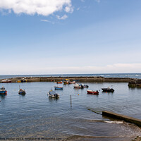 Buy canvas prints of Sunny day at Staithes Harbour, North Yorkshire by Chris Yaxley