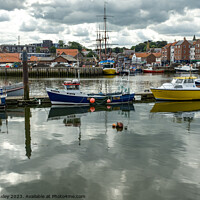 Buy canvas prints of Fishing boats in Whitby marina by Chris Yaxley