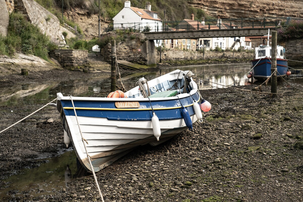 Fishing boat in the seaside village of Staithes Picture Board by Chris Yaxley