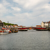 Buy canvas prints of The River in the seaside town of Whitby, North Yorkshire by Chris Yaxley