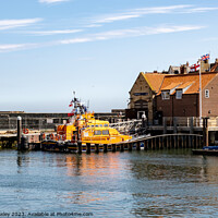 Buy canvas prints of Whitby lifeboat and lifeboat station by Chris Yaxley
