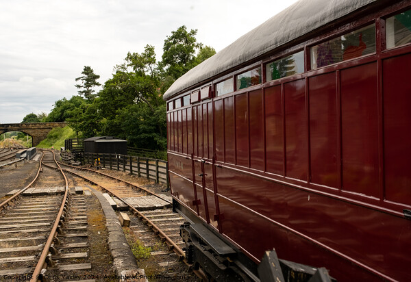 Traditional railway carriage on the North York Moors Railway Picture Board by Chris Yaxley