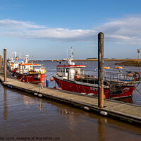 Buy canvas prints of Fishing boats in Wells-next-the-sea harbour by Chris Yaxley