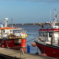Buy canvas prints of Close up of fishing boats in the harbour by Chris Yaxley