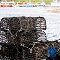 Buy canvas prints of Crab and lobster pots on Wells-next-the-sea quayside by Chris Yaxley