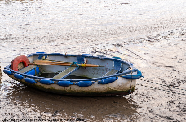 Row boat beached at low tide Picture Board by Chris Yaxley