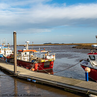Buy canvas prints of Fishing boats in the harbour by Chris Yaxley