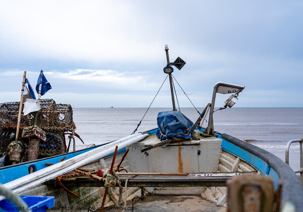 Fishing boat on Sheringham beach, North Norfolk coast Picture Board by Chris Yaxley
