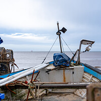 Buy canvas prints of Fishing boat on Sheringham beach, North Norfolk coast by Chris Yaxley