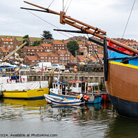 Buy canvas prints of Boats in Whitby harbour by Chris Yaxley