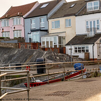 Buy canvas prints of Fishermen's cottages in Sheringham, Norfolk by Chris Yaxley