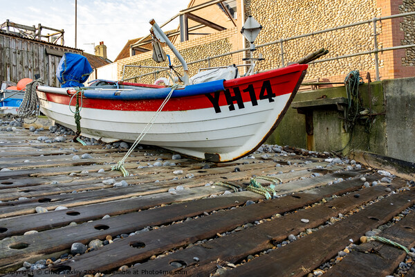 Fishing boat in Sheringham, North Norfolk Picture Board by Chris Yaxley