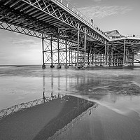 Buy canvas prints of Cromer pier and beach, along exposure by Chris Yaxley