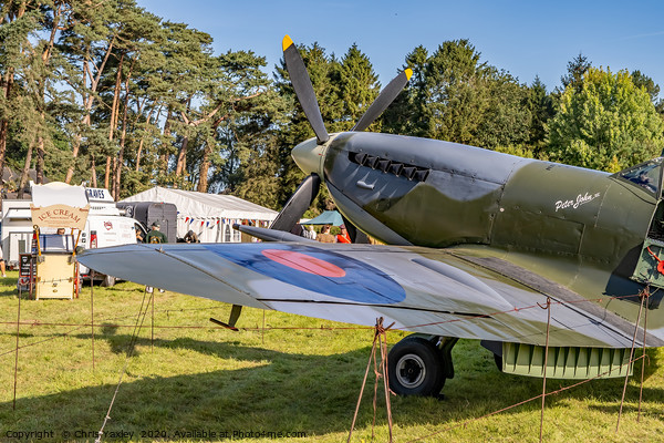 A vintage WW2 Spitfire plane on display  Picture Board by Chris Yaxley