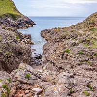 Buy canvas prints of A view over Mewslade Bay at high water by Chris Yaxley