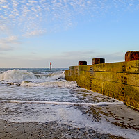 Buy canvas prints of Wooden groyne on the Norfolk coast by Chris Yaxley