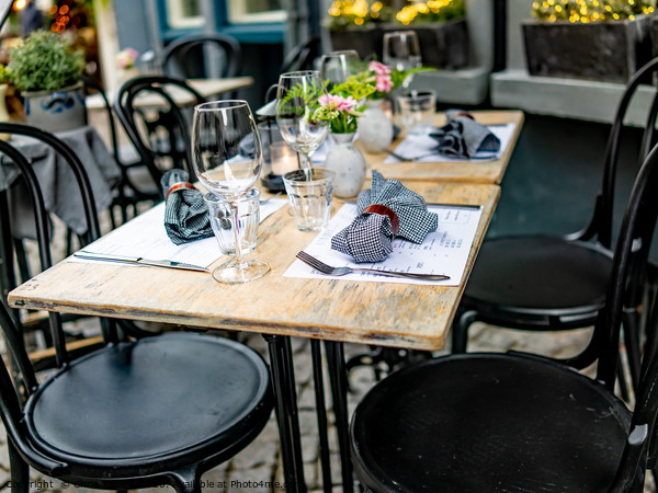 Outdoor seating outside a Dutch restaurant Picture Board by Chris Yaxley