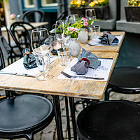 Buy canvas prints of Outdoor seating outside a Dutch restaurant by Chris Yaxley