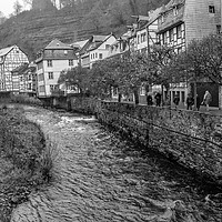 Buy canvas prints of The River Rur flowing the German town of Monschau by Chris Yaxley