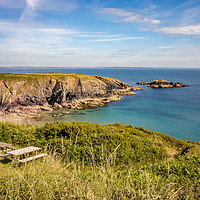 Buy canvas prints of Bench with a view on the Pembrokeshire Coast by Chris Yaxley