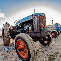 Buy canvas prints of Close up and fisheye view of tractor on Cromer bea by Chris Yaxley