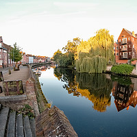 Buy canvas prints of A view along Quayside and the River Wensum by Chris Yaxley