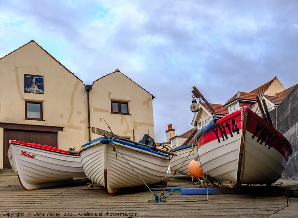 Low down and front on view of fishing boats Picture Board by Chris Yaxley