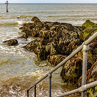 Buy canvas prints of The steps down to Sheringham beach at high water by Chris Yaxley