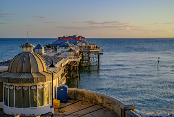 View over Cromer Pier at sunrise Picture Board by Chris Yaxley