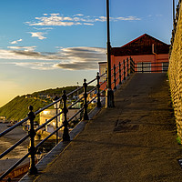 Buy canvas prints of Walking the ramp on Cromer seafront by Chris Yaxley