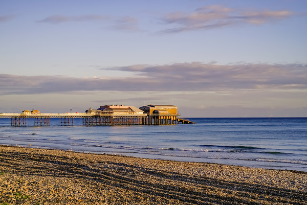Sunrise on Cromer beach Picture Board by Chris Yaxley