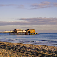 Buy canvas prints of Sunrise on Cromer beach by Chris Yaxley