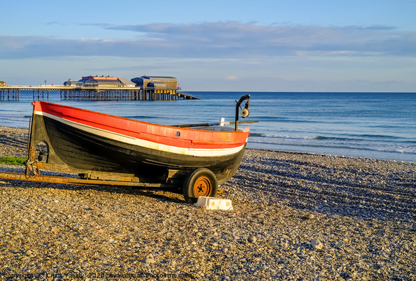 Traditional crab fishing boat on Cromer beach at s Picture Board by Chris Yaxley