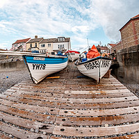 Buy canvas prints of Fisheye view of fishing boats on a wooden slipway  by Chris Yaxley