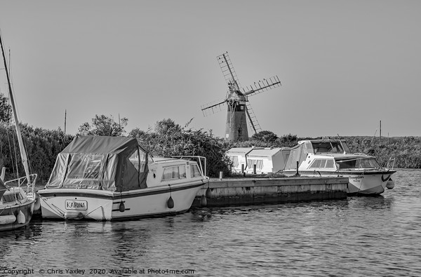 Boats moored at Thurne Mouth, Norfolk Broads bw Picture Board by Chris Yaxley