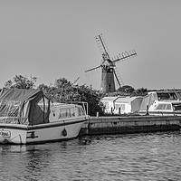Buy canvas prints of Boats moored at Thurne Mouth, Norfolk Broads bw by Chris Yaxley