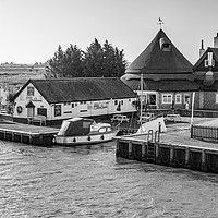 Buy canvas prints of Acle Bridge pub on the Norfolk Broads bw by Chris Yaxley