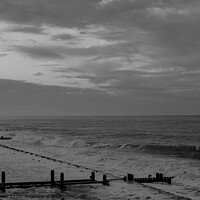 Buy canvas prints of Sunset on the Norfolk coast bw by Chris Yaxley
