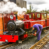 Buy canvas prints of Working on the Mark Timothy steam train on the Bur by Chris Yaxley